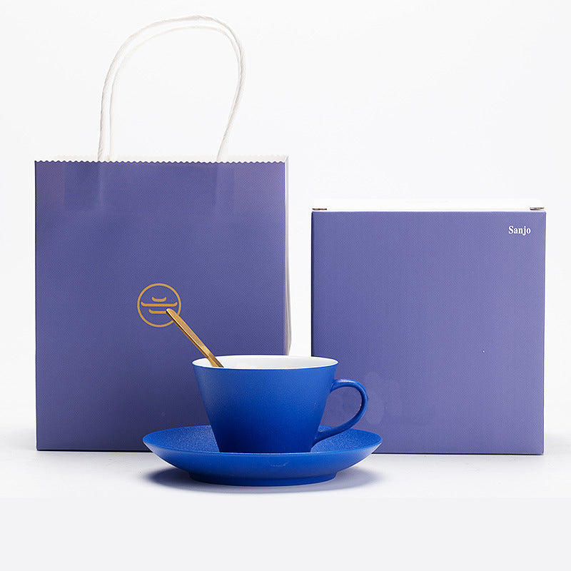 Handmade Klein blue horseshoe-shaped coffee cup for home.