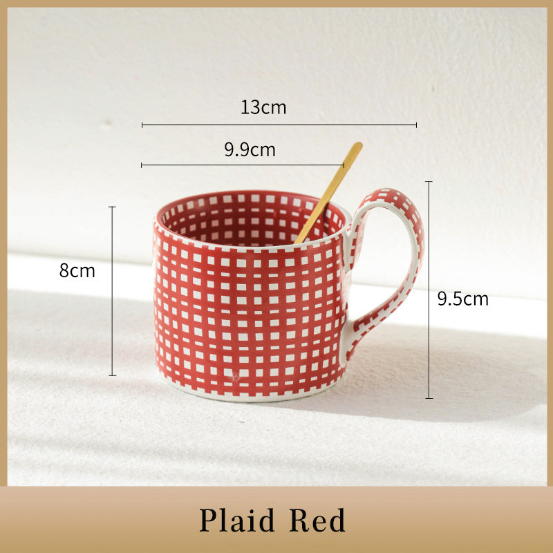 Large capacity ceramic cup with geometric checkered pattern.