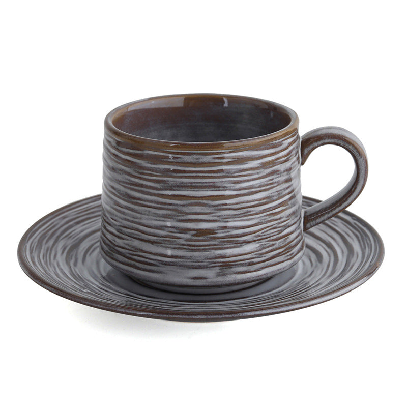 Taza de cerámica jaspeada gris-blanco artesanal para entusiastas del café