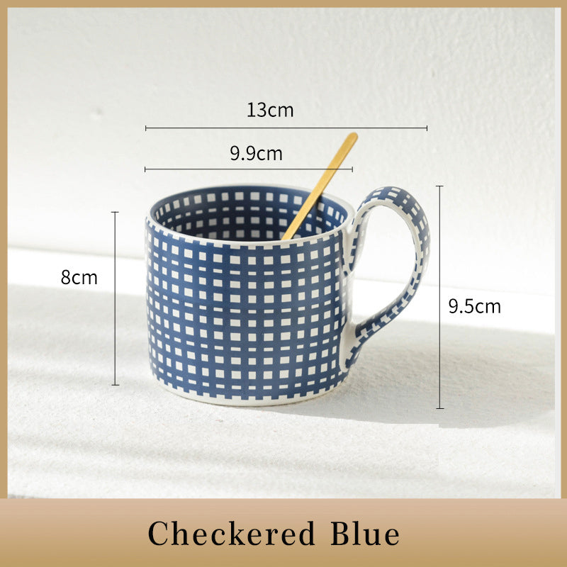 Large capacity ceramic cup with geometric checkered pattern.