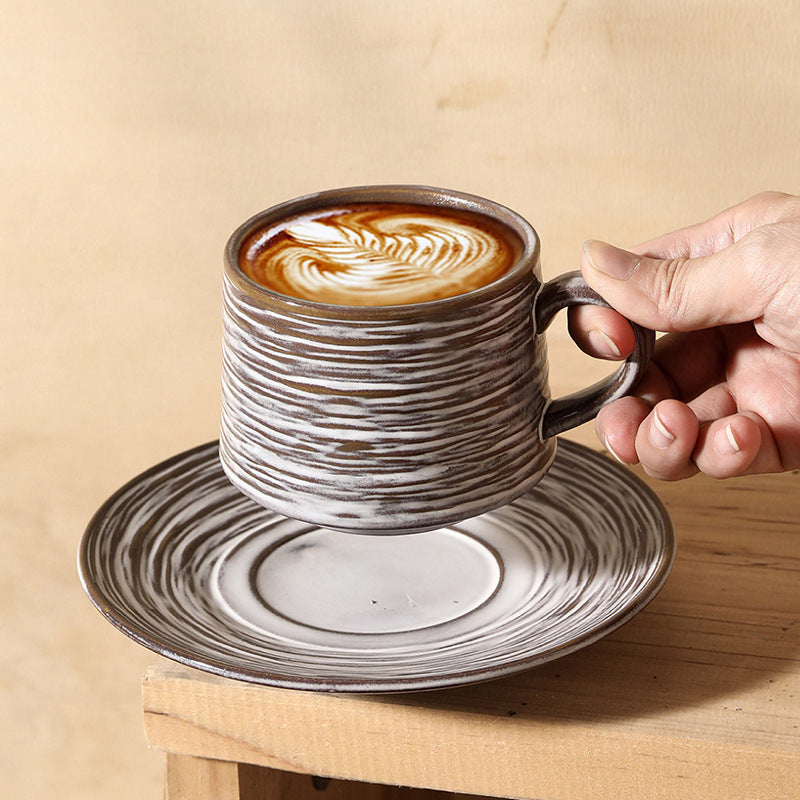 Taza de cerámica jaspeada gris-blanco artesanal para entusiastas del café