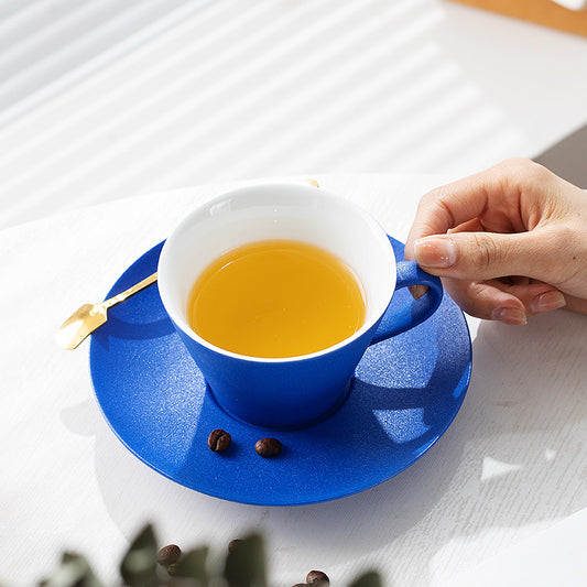 Handmade Klein blue horseshoe-shaped coffee cup for home.