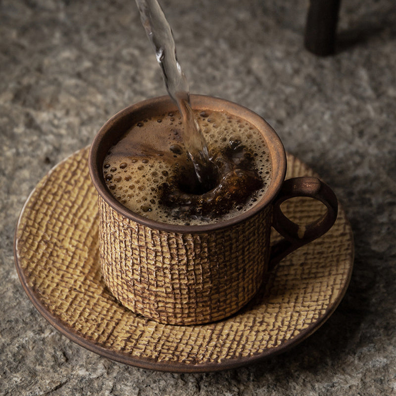 Japanese ceramic coffee cup with relief.