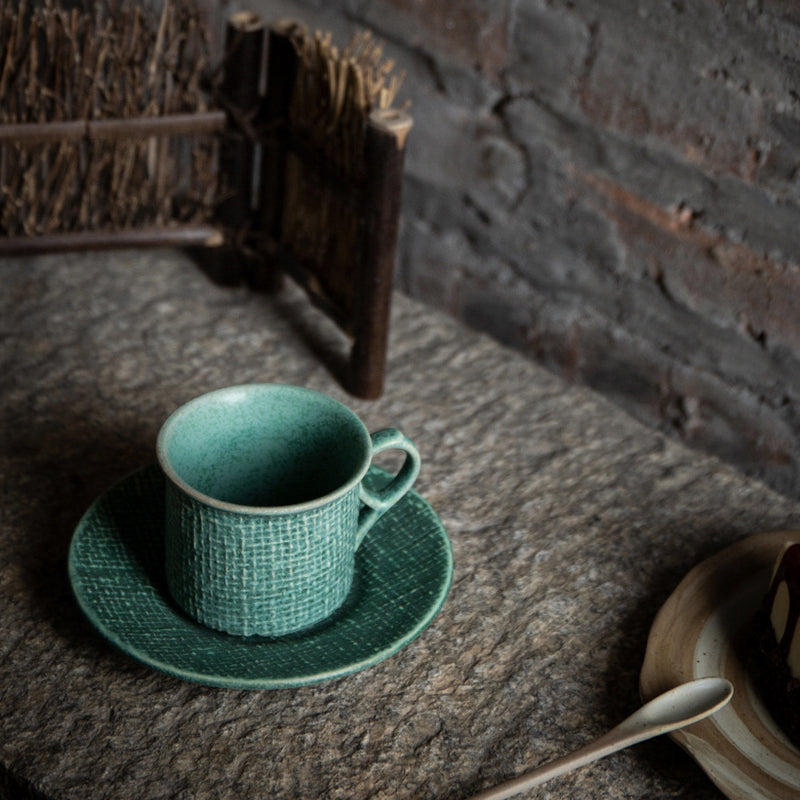 Japanese ceramic coffee cup with relief.