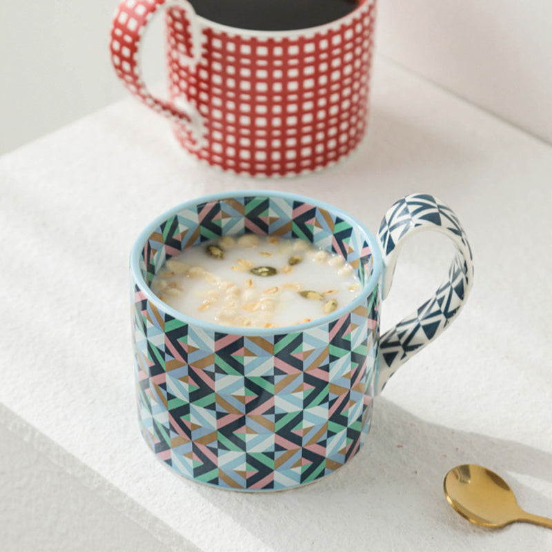 Large capacity ceramic cup with geometric checkered pattern.